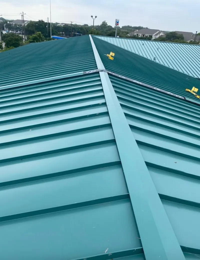 Green commercial metal roof ridge and valley for Metal Roof Repair in White Oak